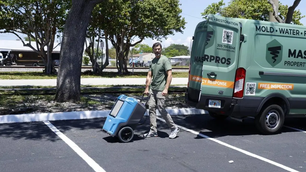 Water damage restoration equipment drying a Miami property