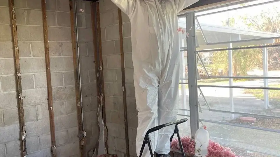 Ceiling demolition during professional property restoration after water damage in Hollywood, FL