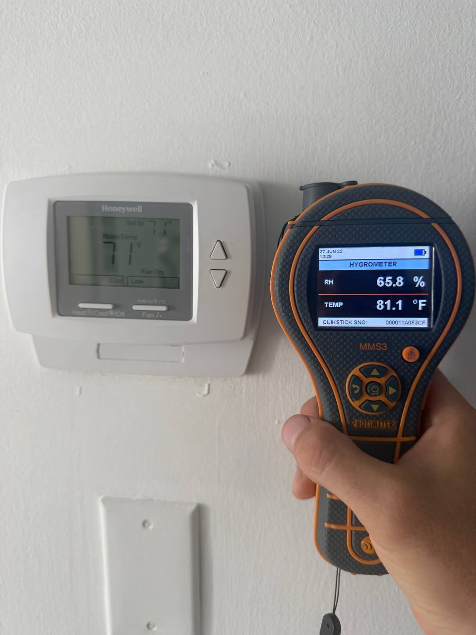Indoor humidity and temperature measured with a digital hygrometer during the mold inspection.