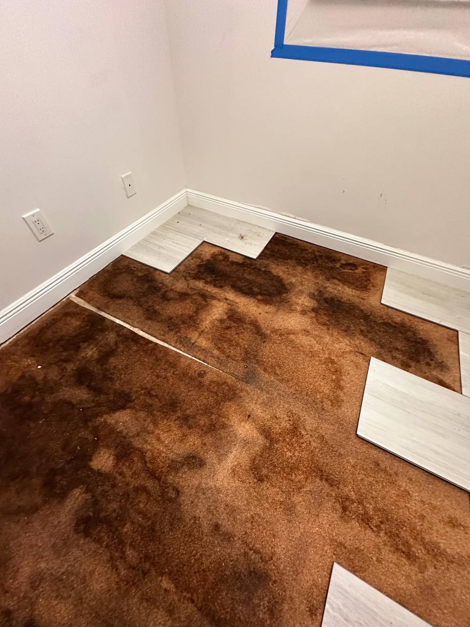 Installing new flooring over treated subfloor area