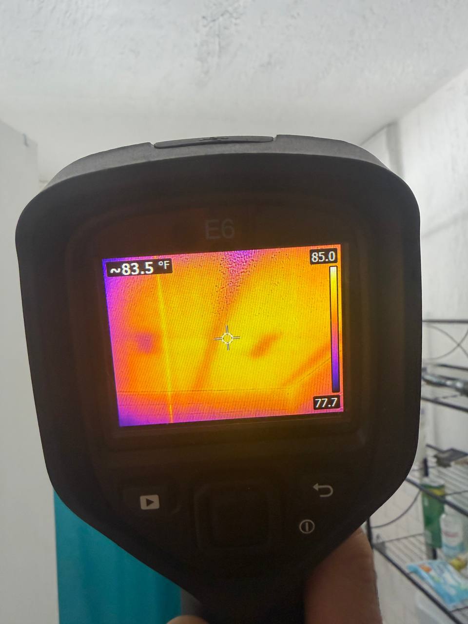 Infrared thermal inspection mapping AC condensation water intrusion behind drywall