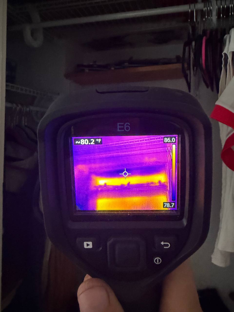FLIR thermal camera revealing cold moisture footprint from ceiling leak