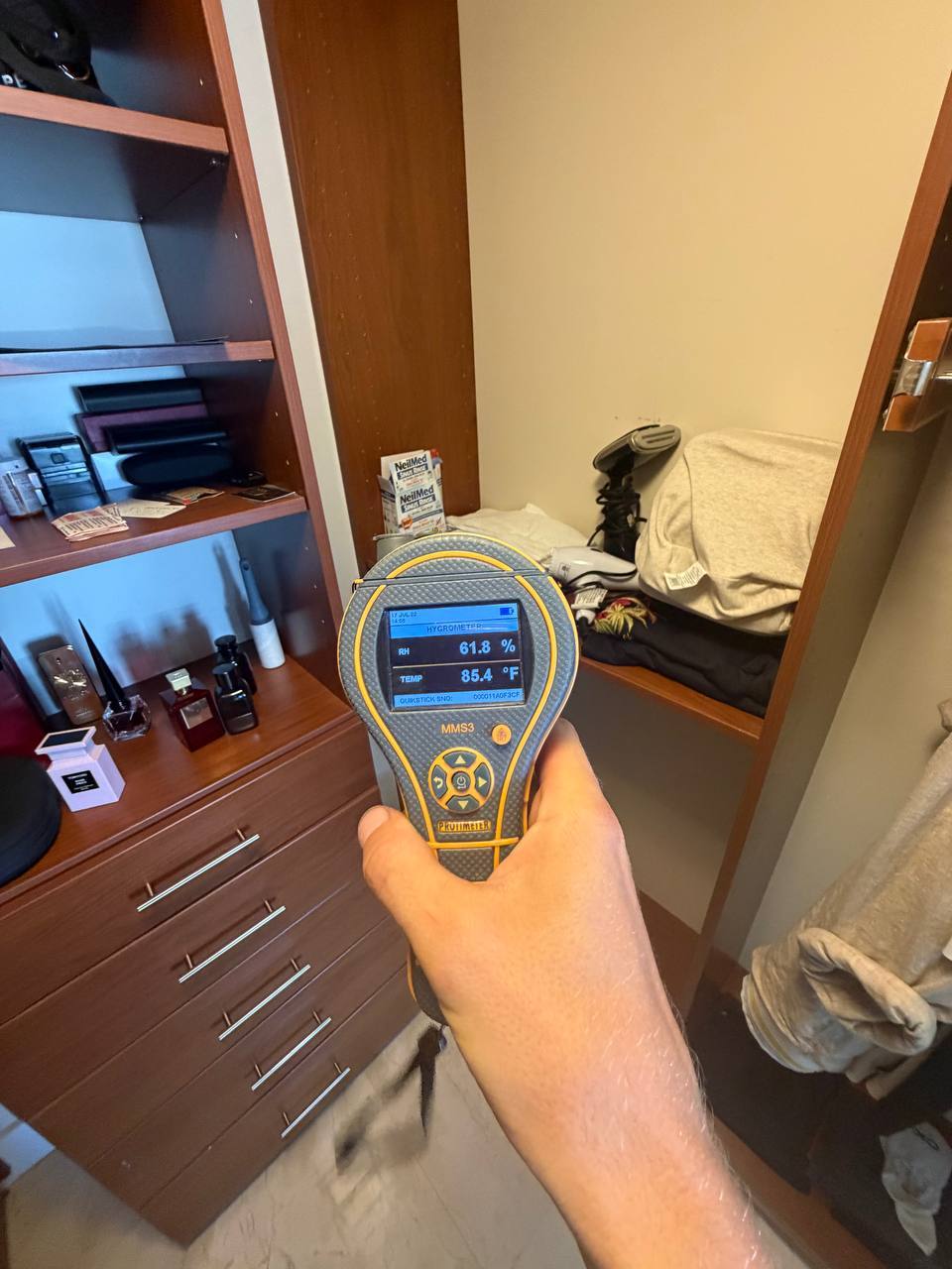 Protimeter MMS3 displaying elevated ambient humidity levels inside bedroom closet