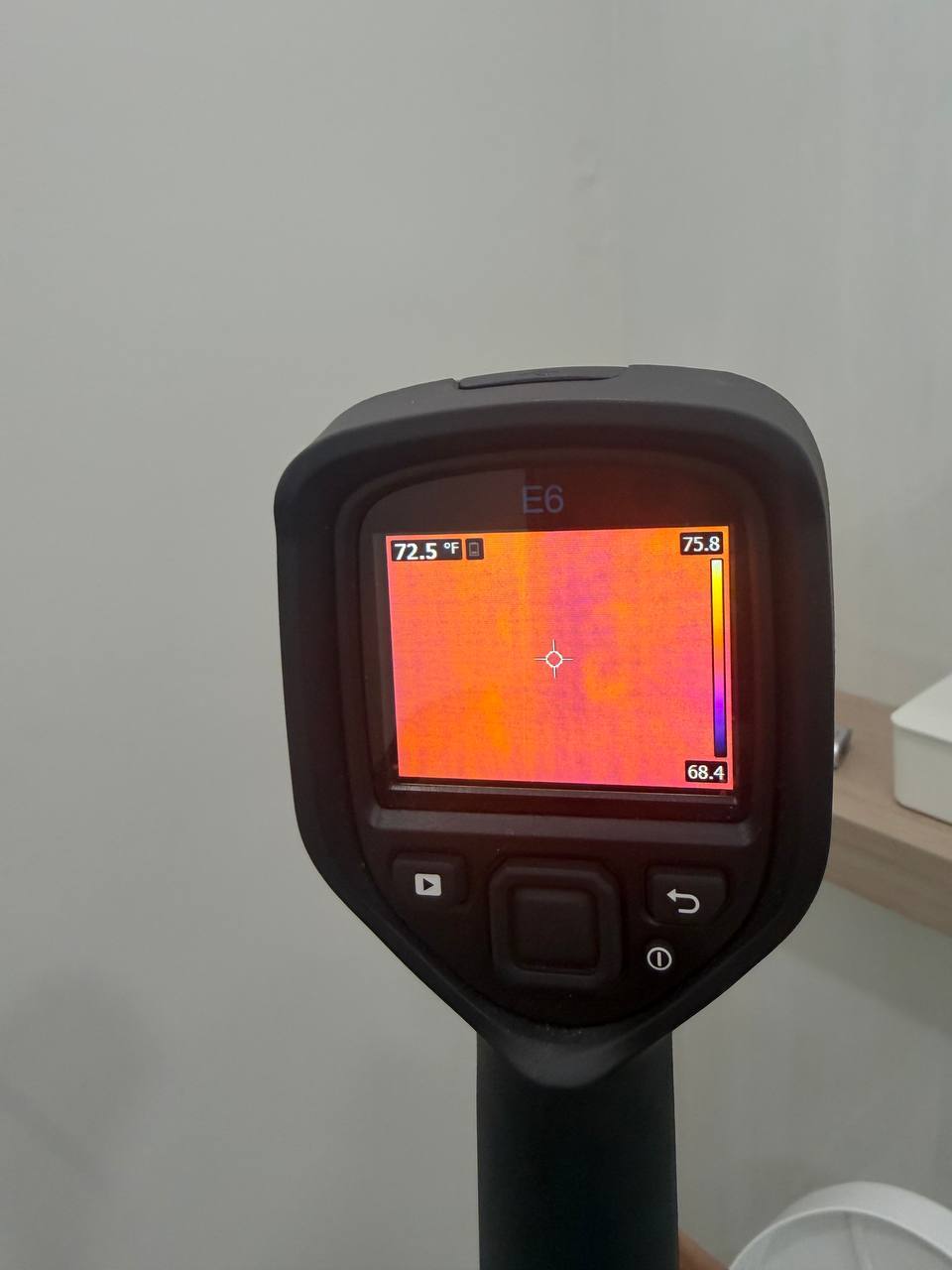 FLIR thermal imaging detecting cold thermal signature from attic moisture intrusion