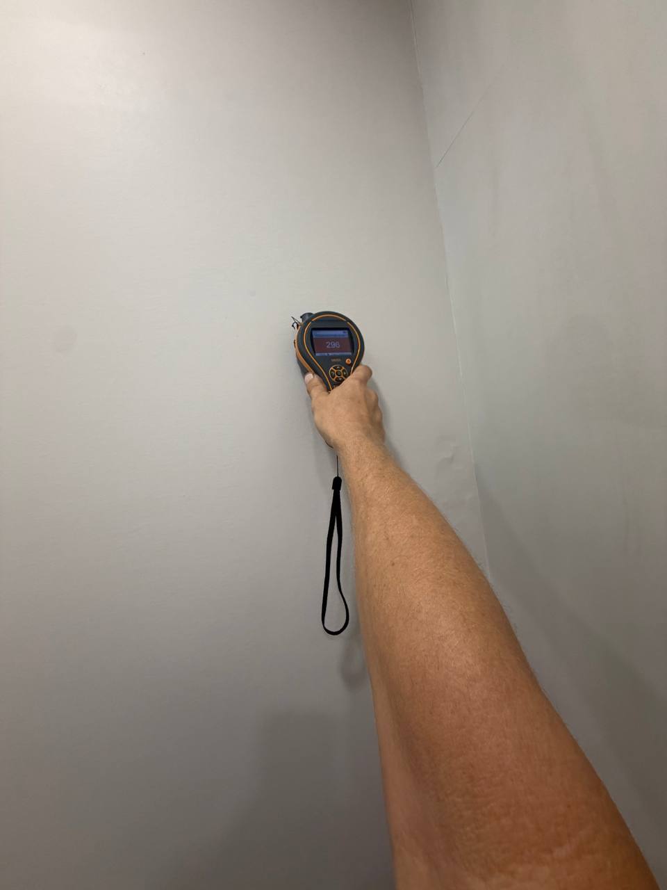 Measuring moisture content in interior drywall below attic ductwork