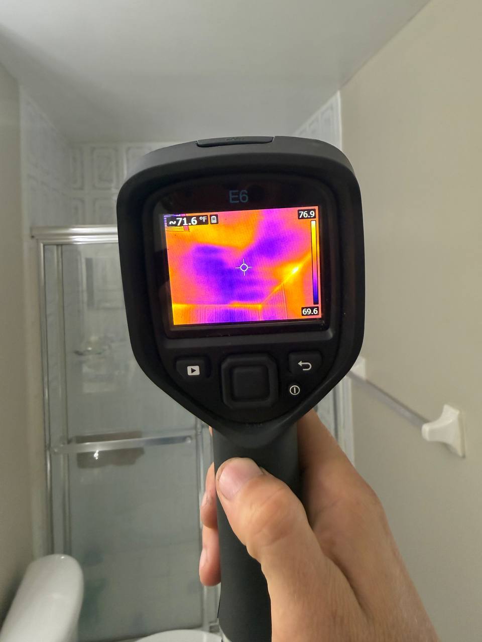 FLIR thermal camera showing cold temperature pattern from ductwork condensation