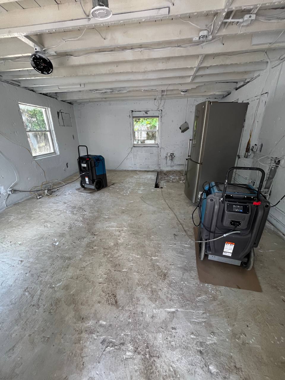 Commercial LGR dehumidifiers set up inside historic property during structural drying