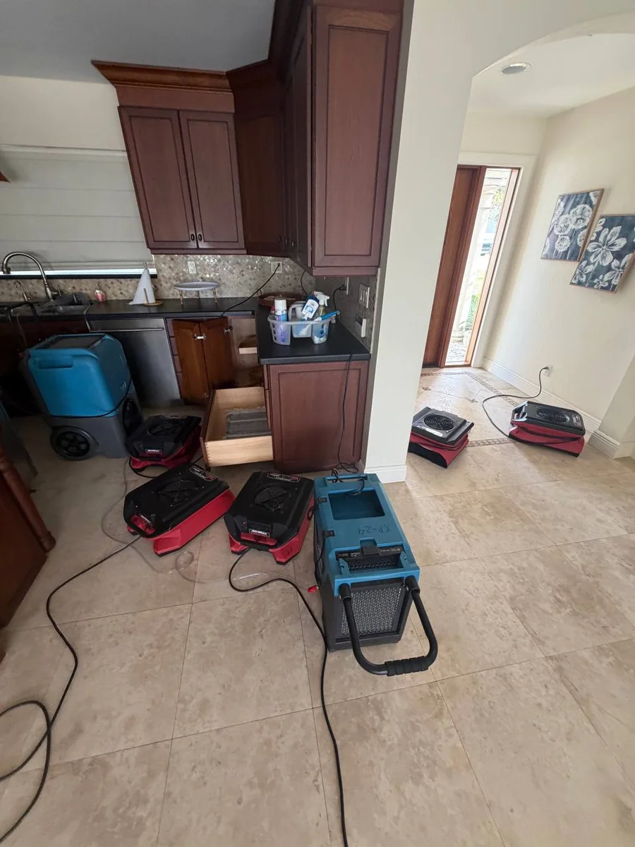 Structural drying equipment deployed after burst pipe