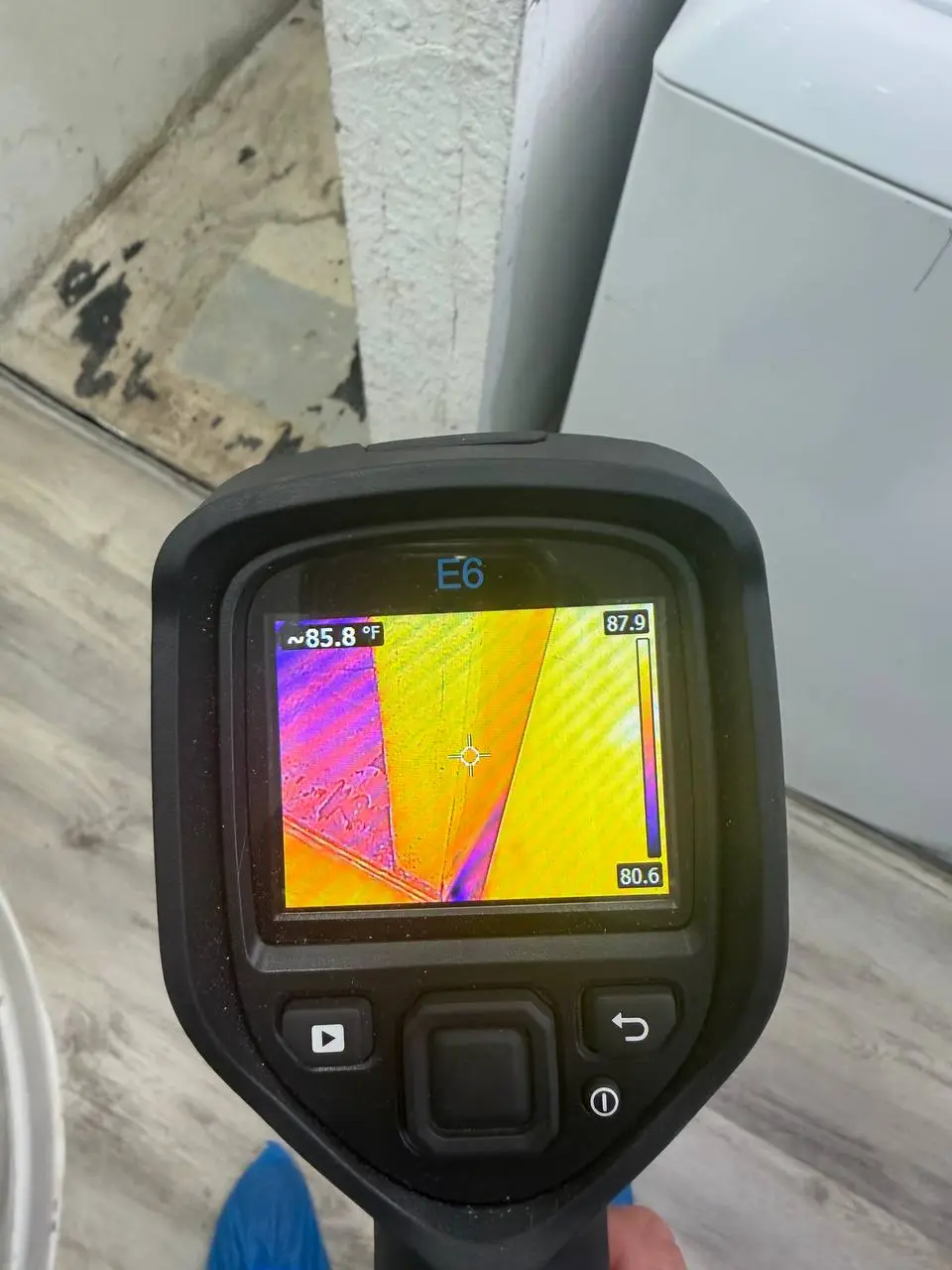 Restored area after dishwasher leak water damage restoration