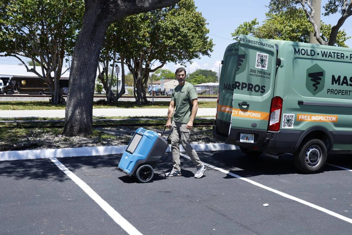 Water damage restoration equipment drying a Miami property